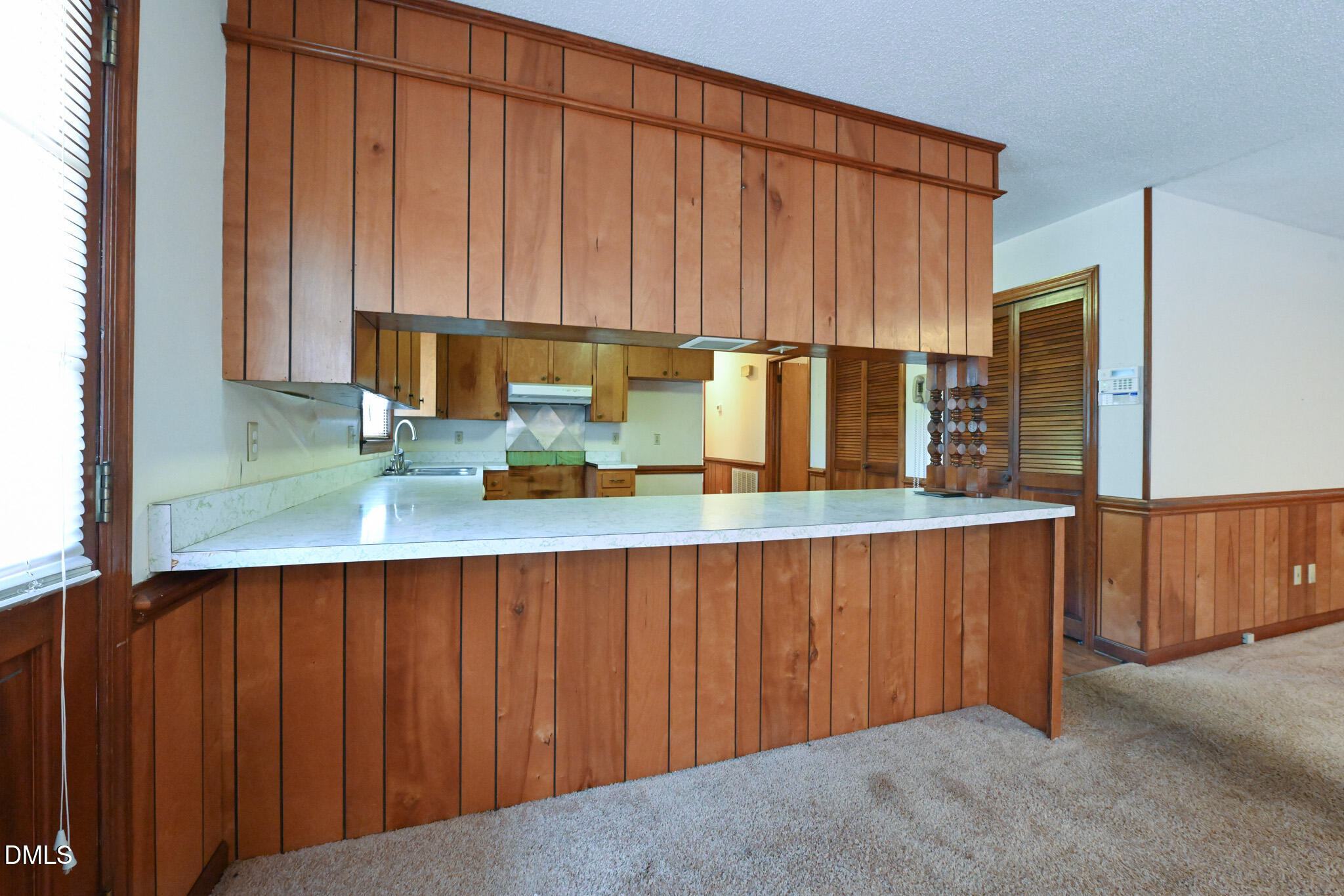 3011 Will Lucas Road Linden, NC 28356 - Photo 10 of 35 a kitchen with a sink refrigerator and cabinets