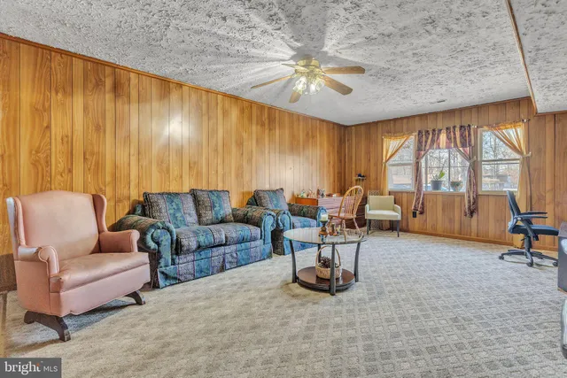 a front view of a house with large window