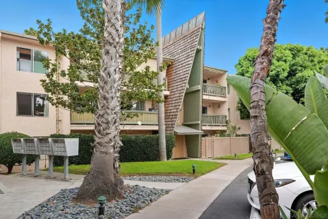 an aerial view of a house with outdoor space