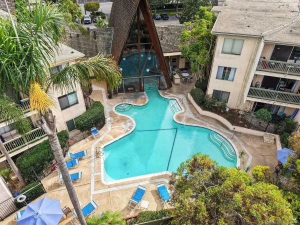 an aerial view of a house with outdoor space