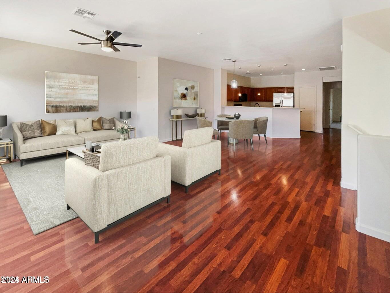 805 South Sycamore, Unit 222 Mesa, AZ 85202 - Photo 7 of 10 a living room with furniture and a wooden floor