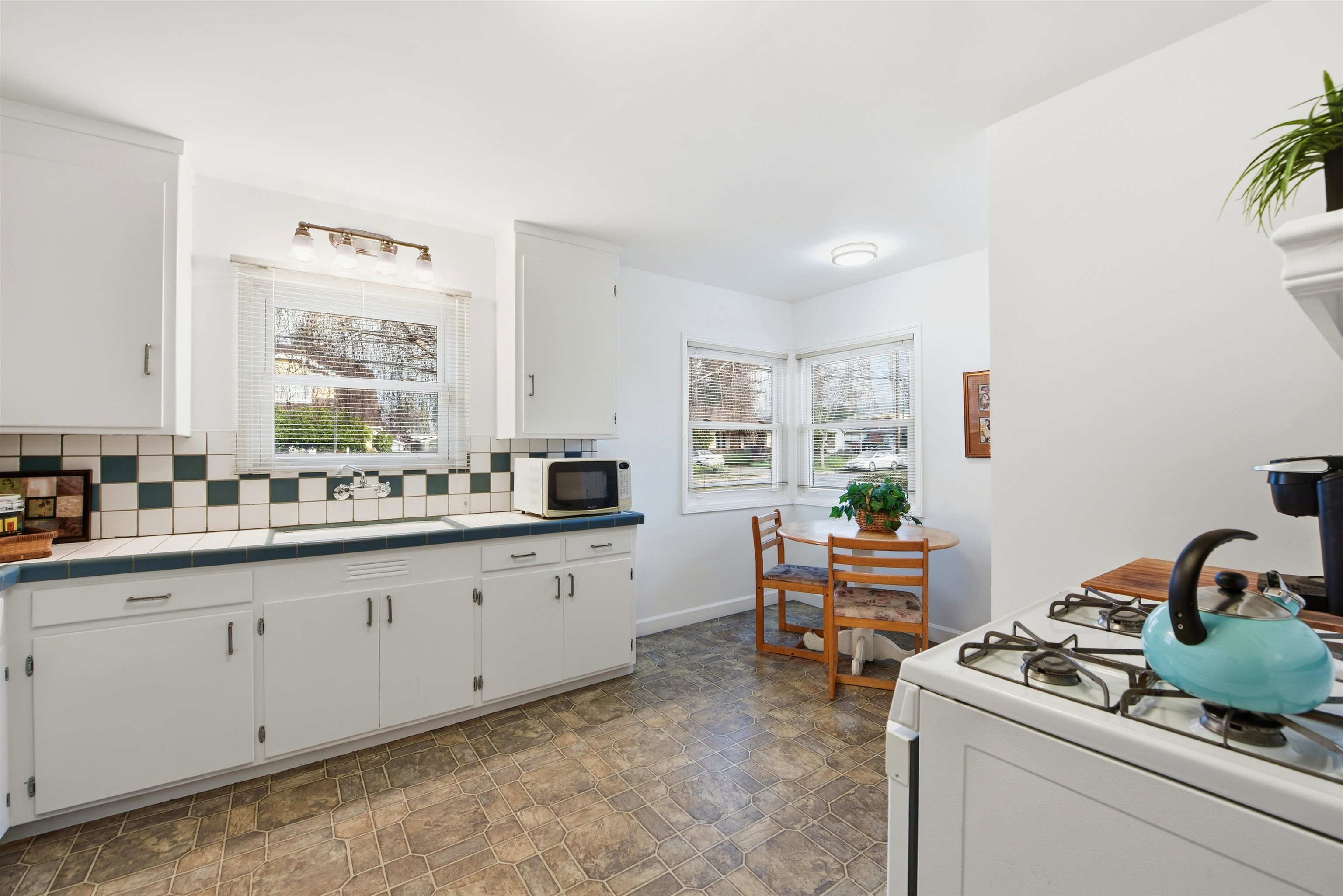 1903 Bradhoff Avenue San Leandro, CA 94577 - Photo 12 of 34 a kitchen with sink cabinets and appliances