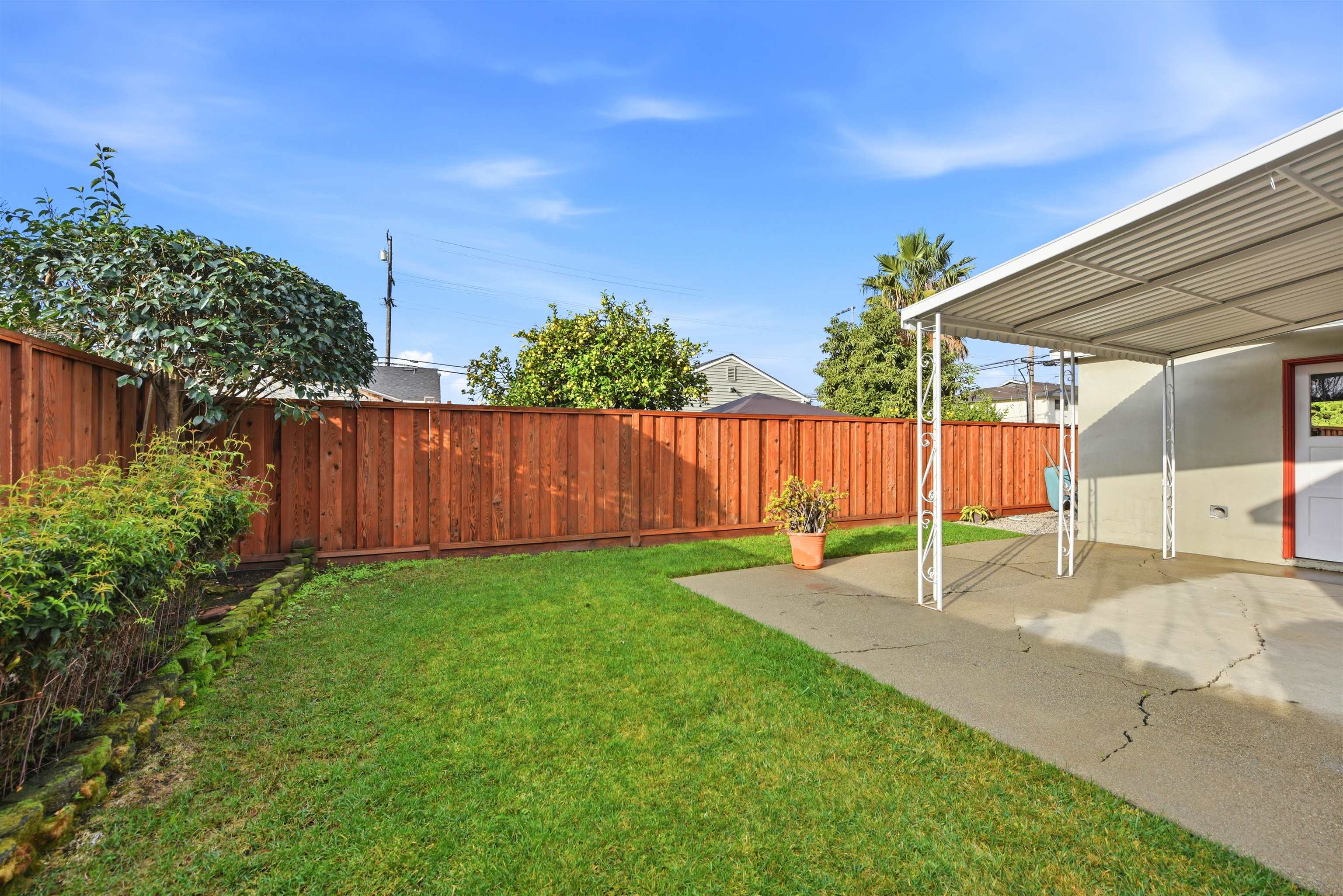 1903 Bradhoff Avenue San Leandro, CA 94577 - Photo 29 of 34 a view of a backyard with a house