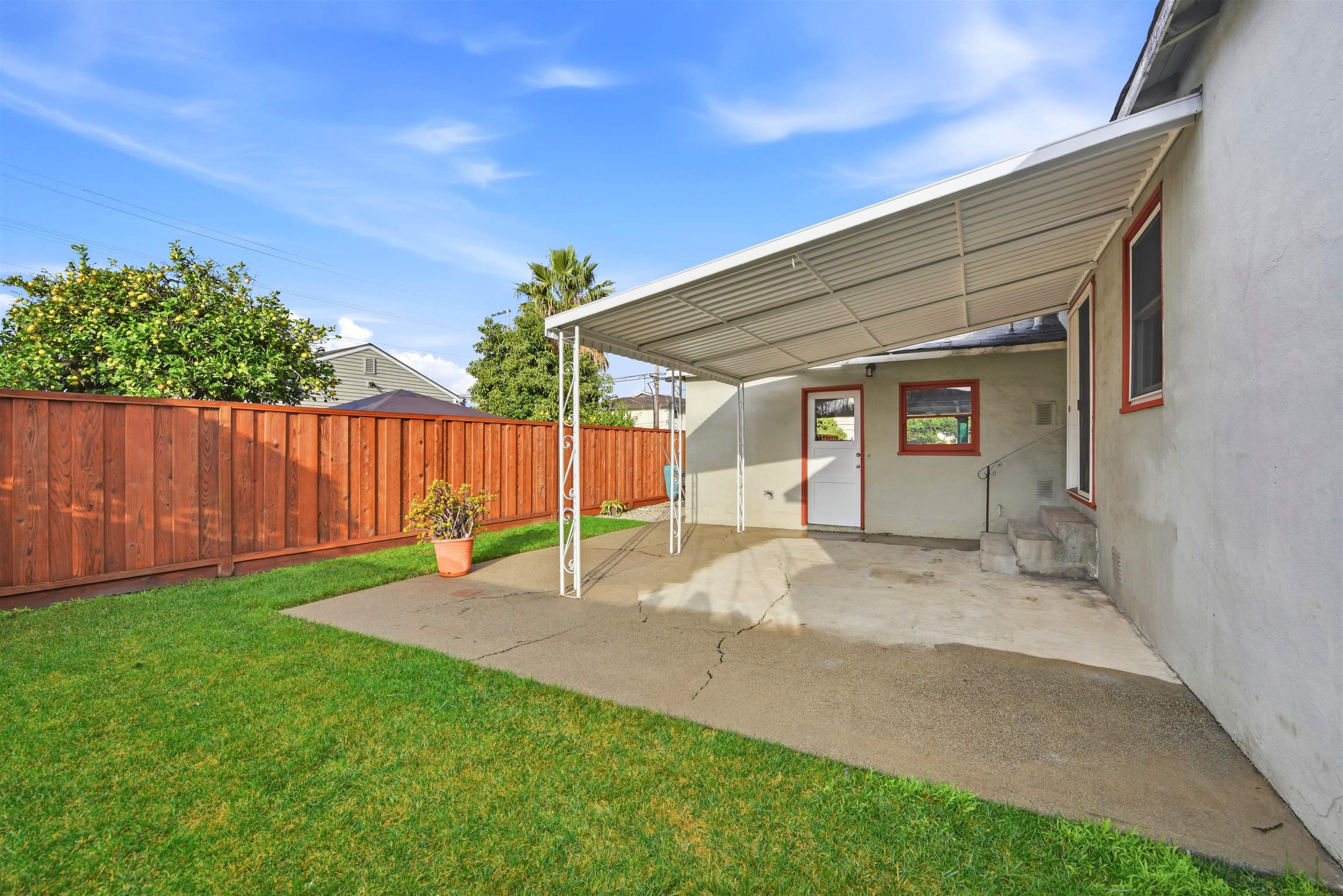 1903 Bradhoff Avenue San Leandro, CA 94577 - Photo 31 of 34 a view of an house with backyard and a tree