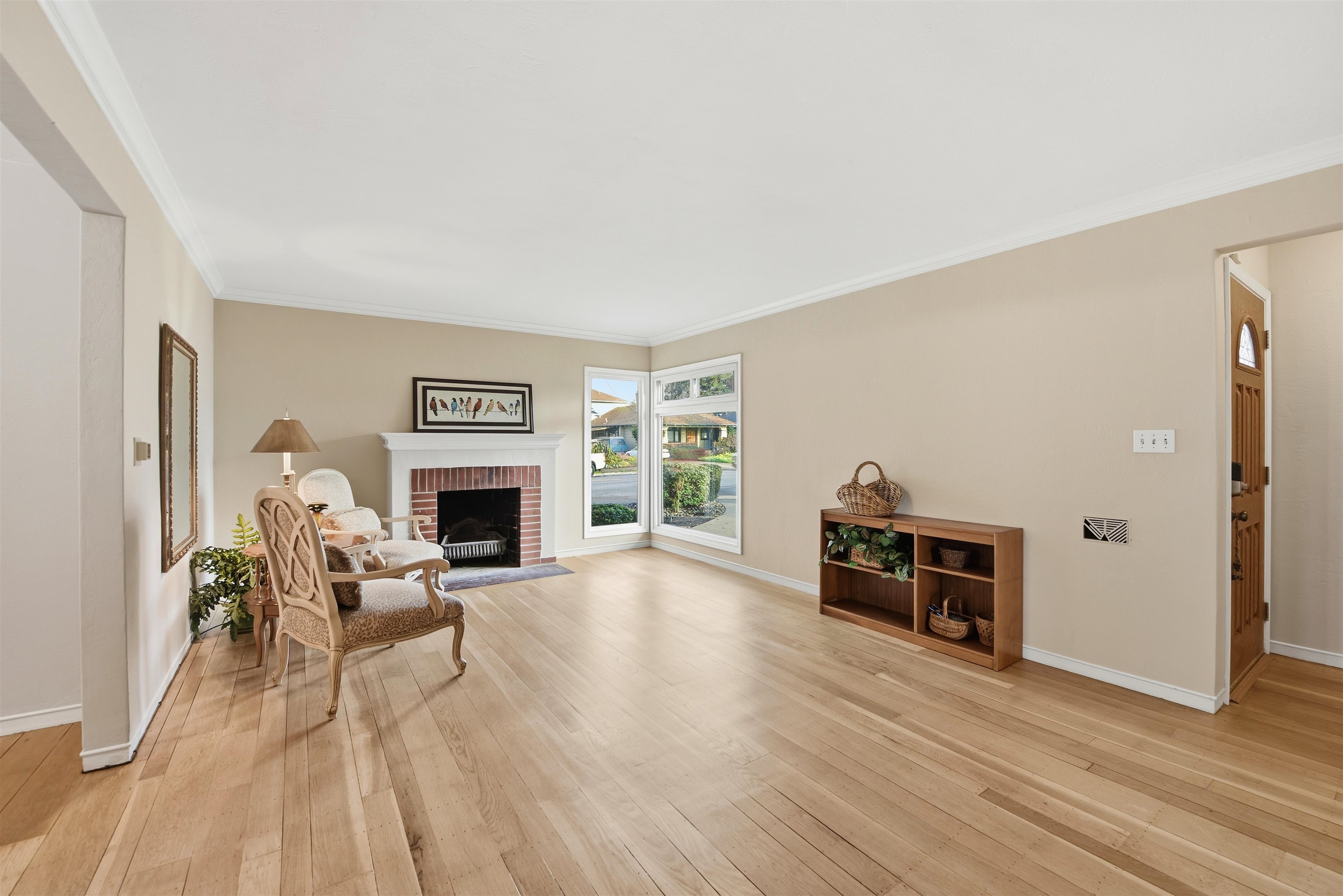 1903 Bradhoff Avenue San Leandro, CA 94577 - Photo 7 of 34 a living room with furniture a fireplace and a flat screen tv