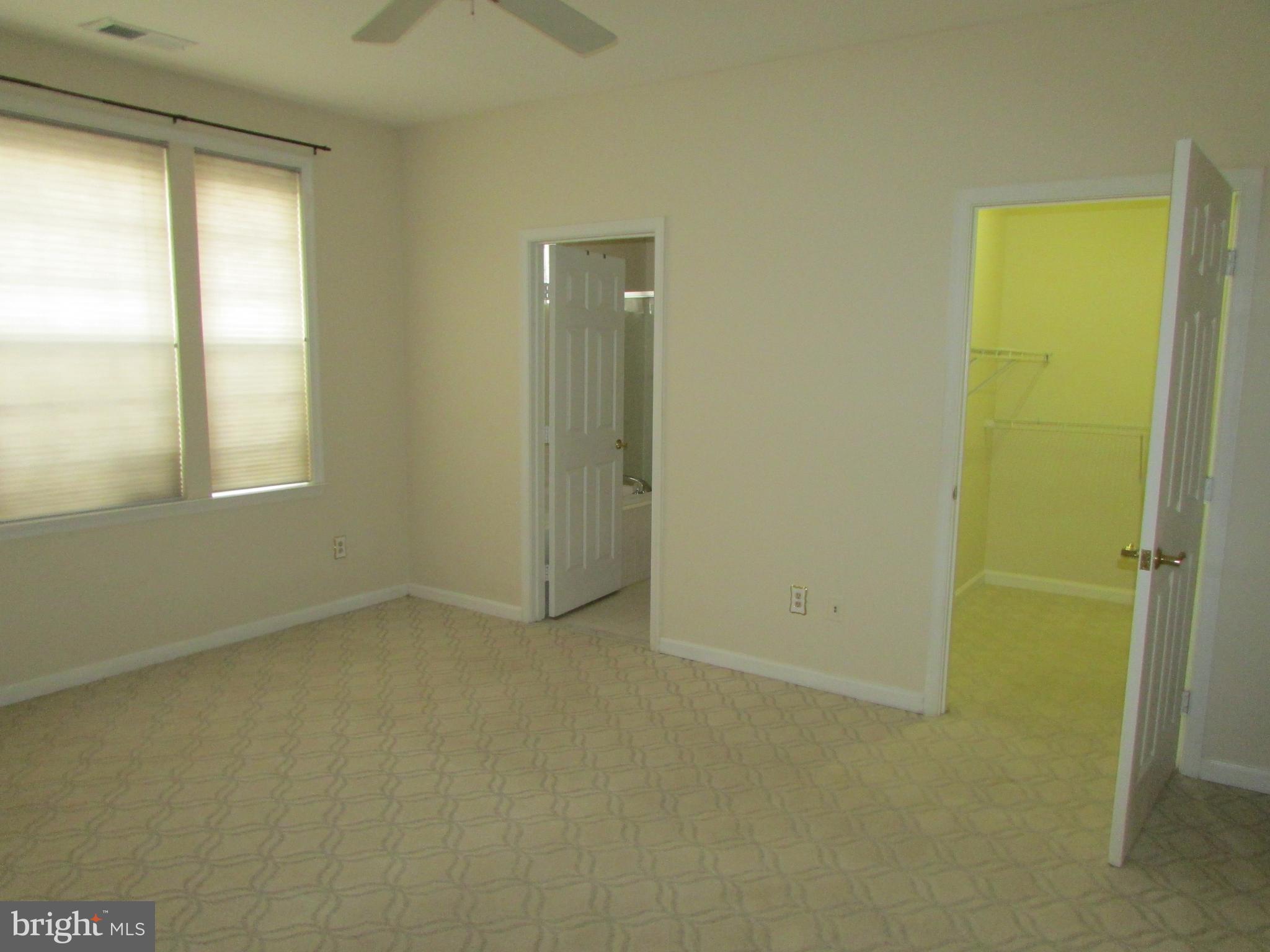 7035 Haycock Road, Unit 103 Falls Church, VA 22043 - Photo 2 of 12 Primary Bedroom