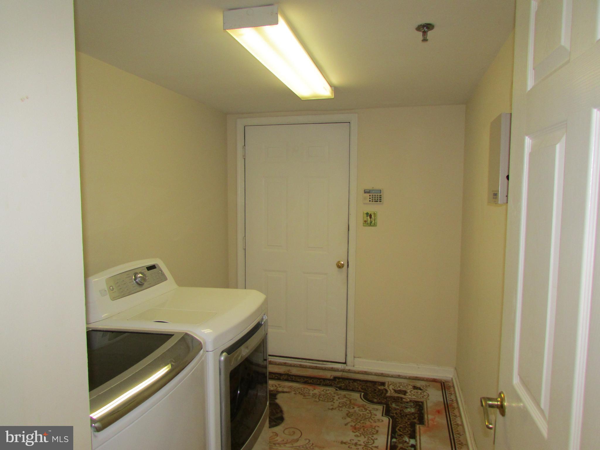 7035 Haycock Road, Unit 103 Falls Church, VA 22043 - Photo 8 of 12 Laundry/Mud Room w/ Garage Entrance