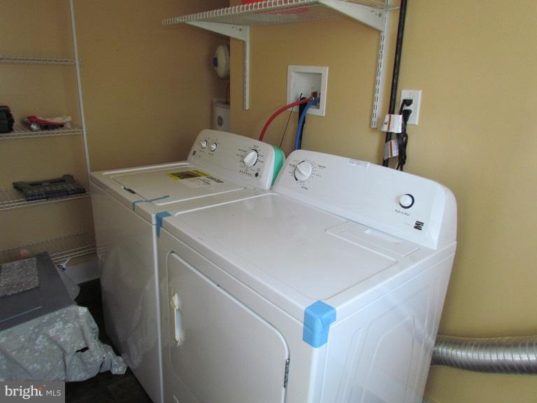772 223rd Street Pasadena, MD 21122 - Photo 13 of 13 a utility room with dryer and washer
