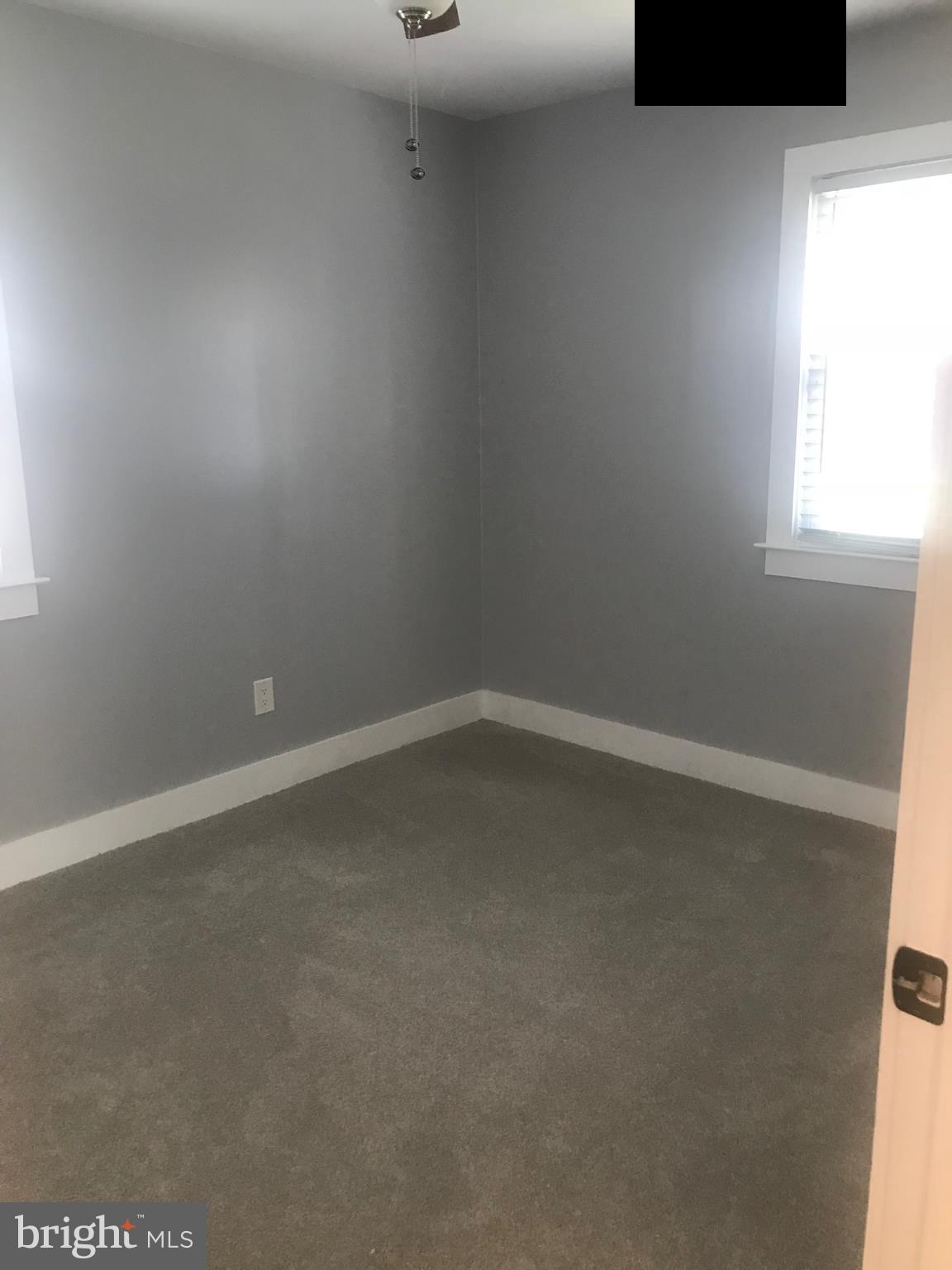 772 223rd Street Pasadena, MD 21122 - Photo 9 of 13 a room that has a window in it