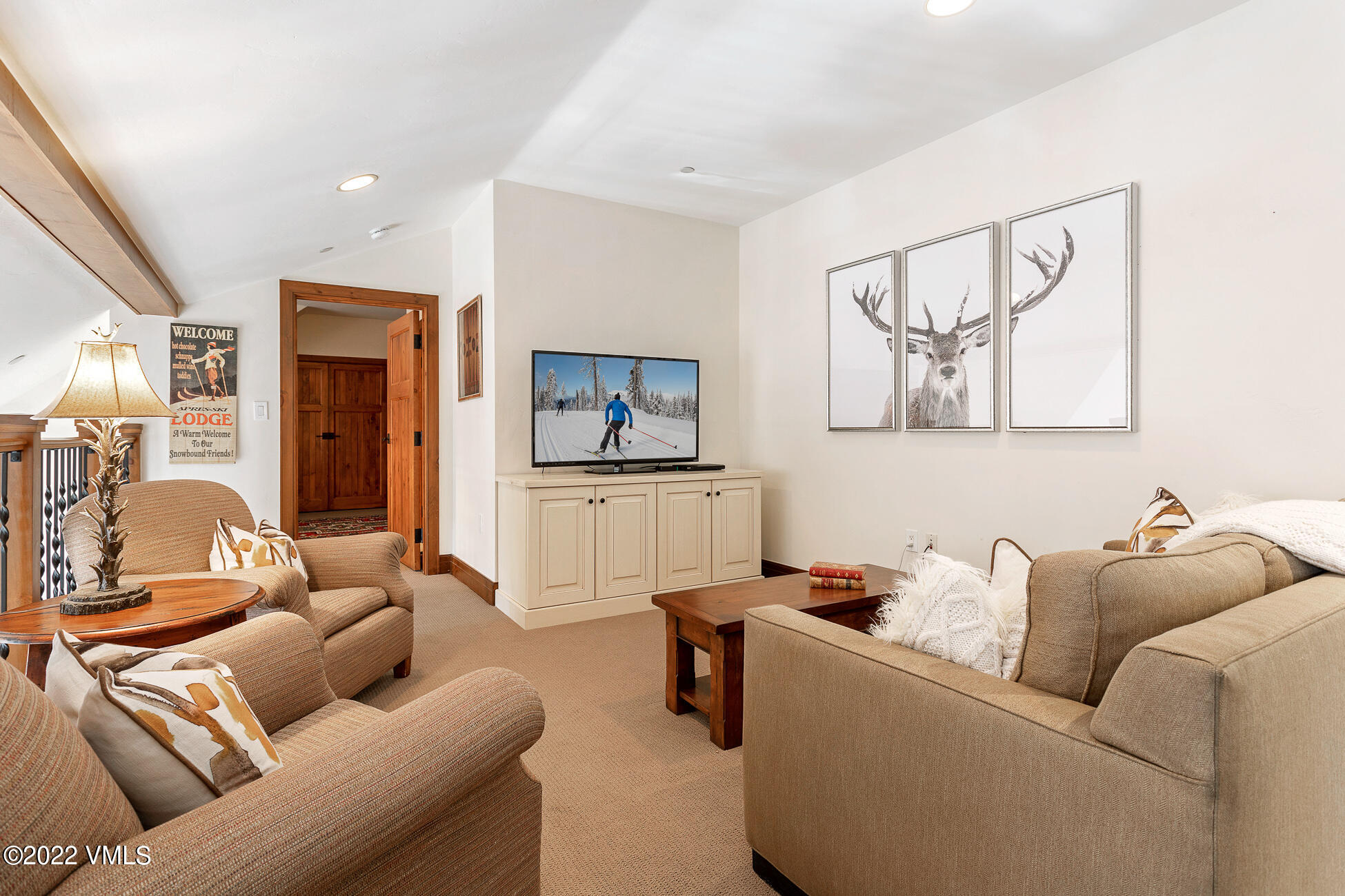 180 Daybreak Ridge Road, Unit 813 Avon, CO 81620 - Photo 27 of 46 a living room with furniture and a couch