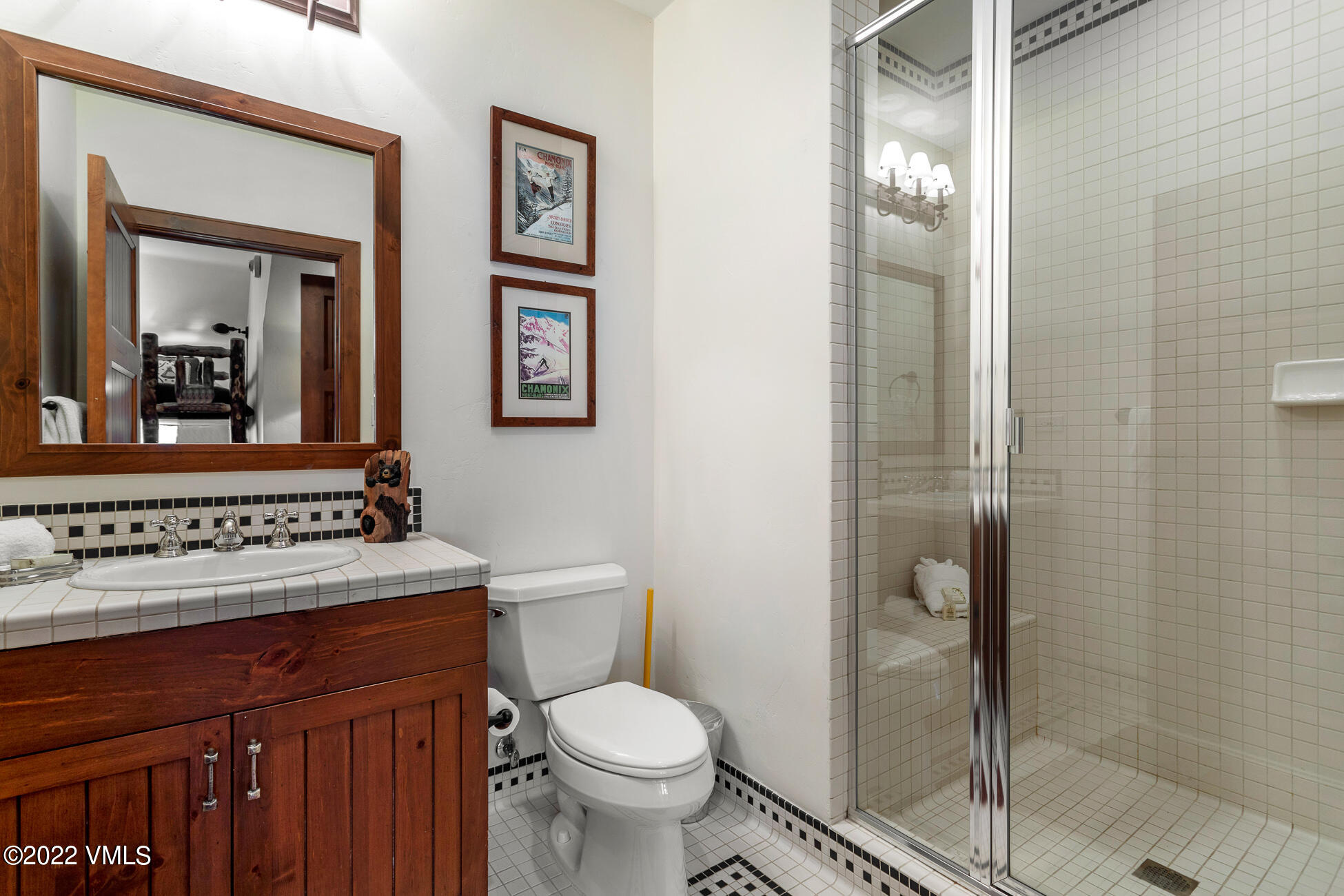 180 Daybreak Ridge Road, Unit 813 Avon, CO 81620 - Photo 29 of 46 a bathroom with a toilet sink and shower