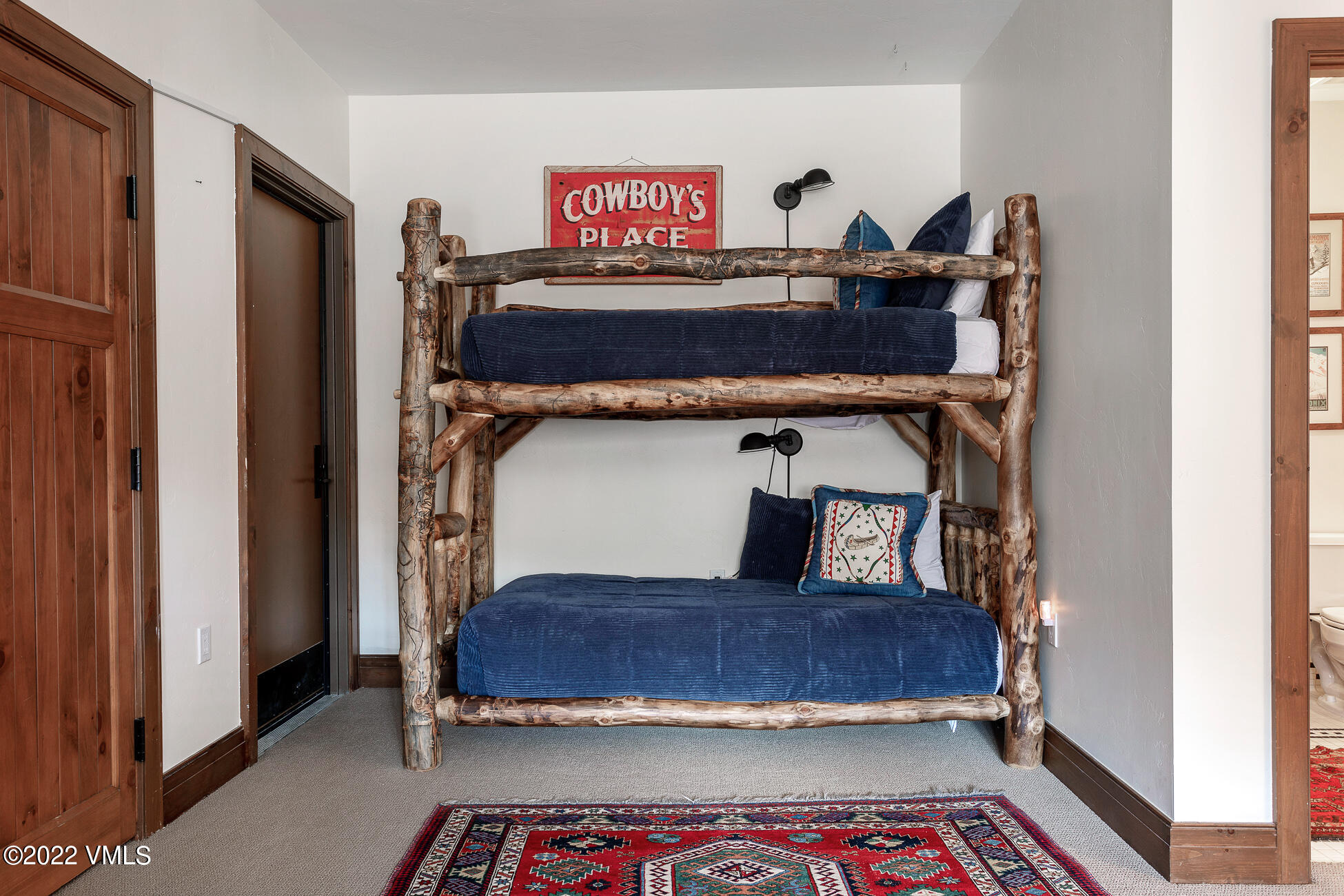 180 Daybreak Ridge Road, Unit 813 Avon, CO 81620 - Photo 31 of 46 a bedroom with a bed and a window