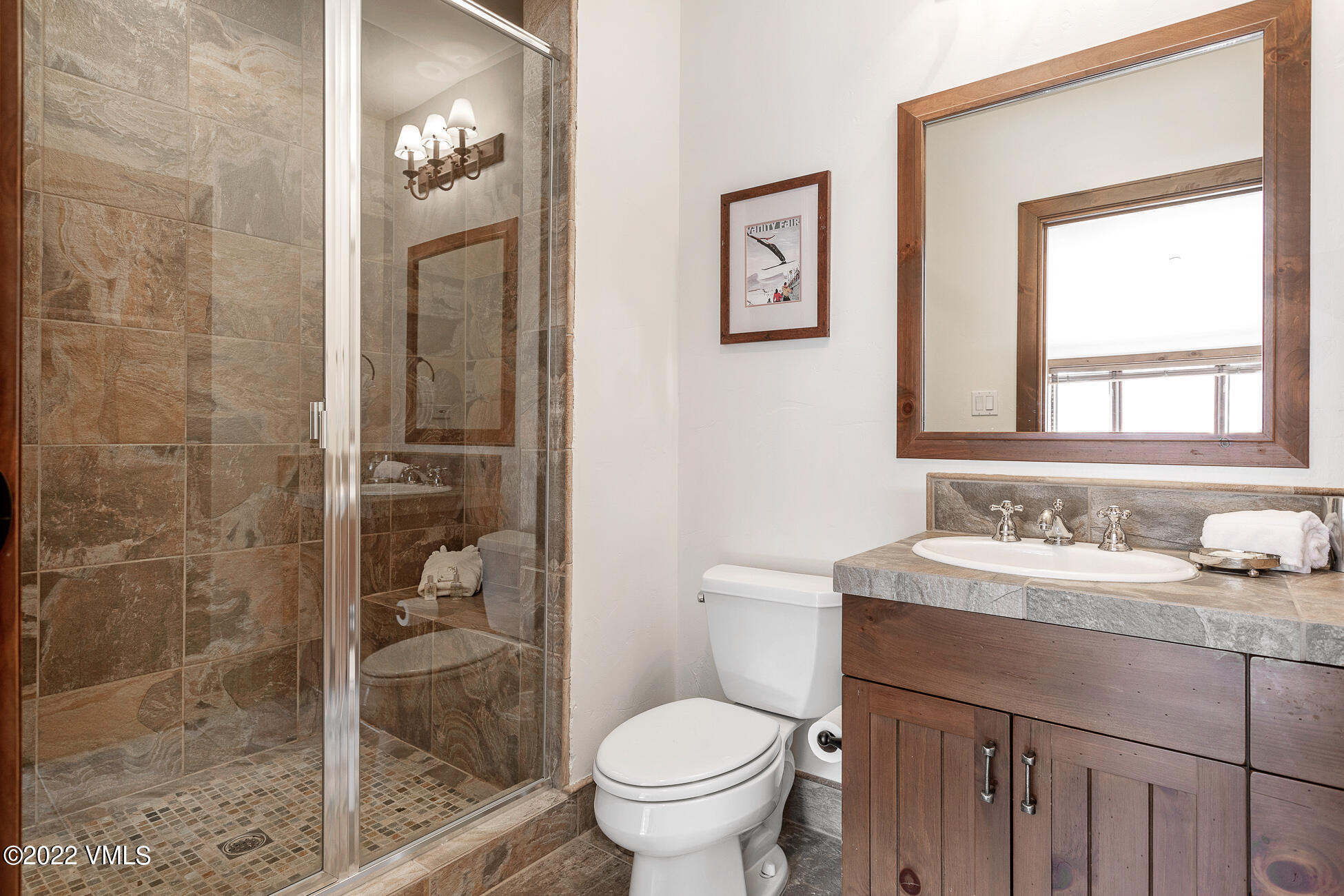 180 Daybreak Ridge Road, Unit 813 Avon, CO 81620 - Photo 35 of 46 a bathroom with a sink toilet and shower