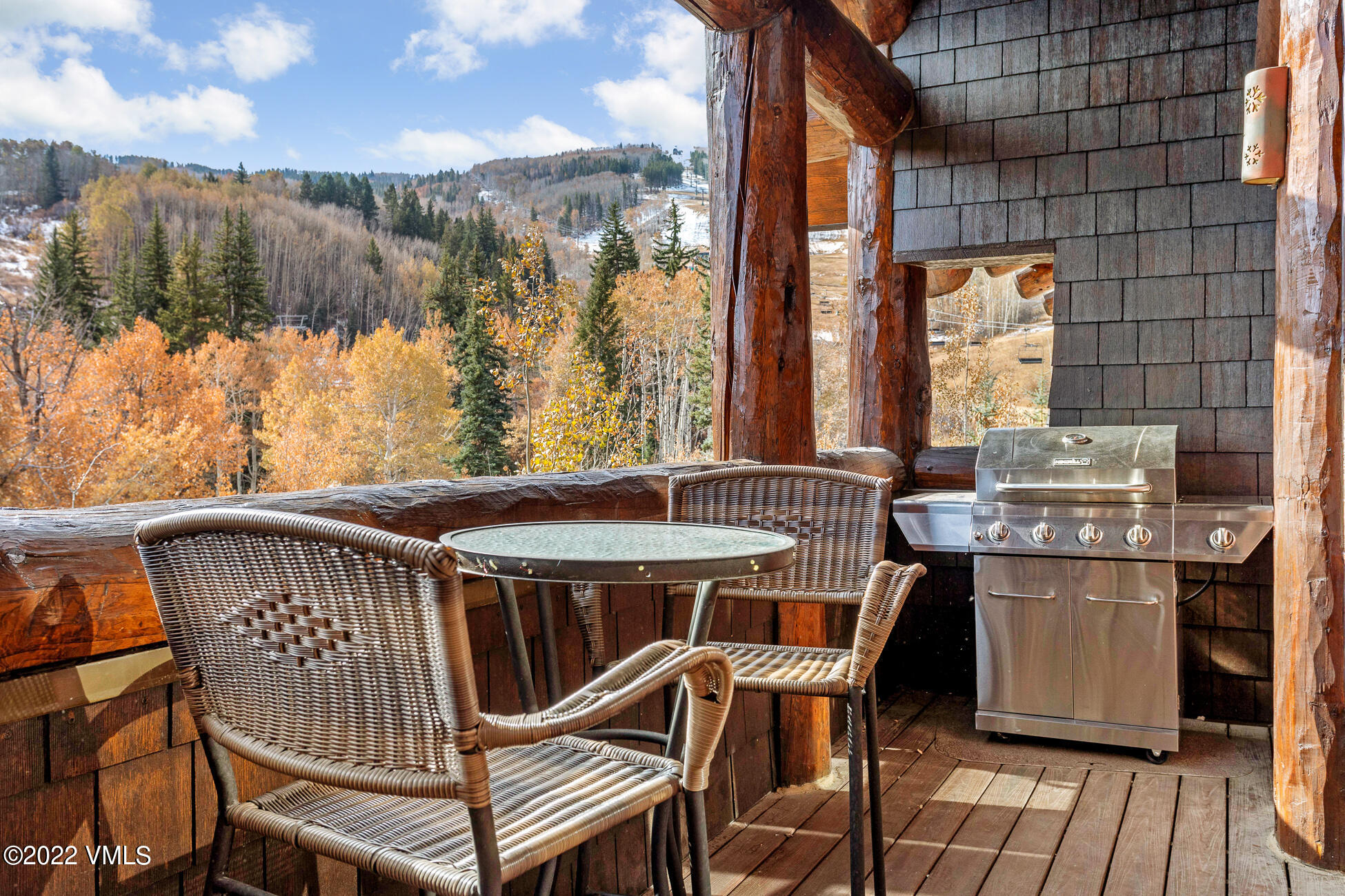 180 Daybreak Ridge Road, Unit 813 Avon, CO 81620 - Photo 38 of 46 a view of a balcony with furniture