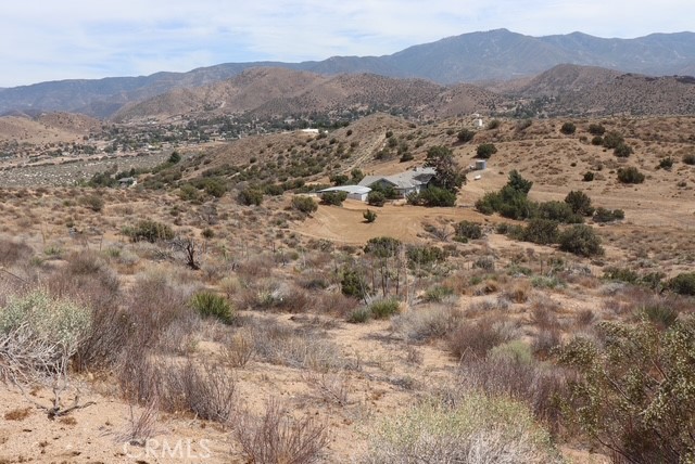 0 Brogan Road Acton, CA 93510 - Photo 18 of 19 a view of a town with mountains in the background