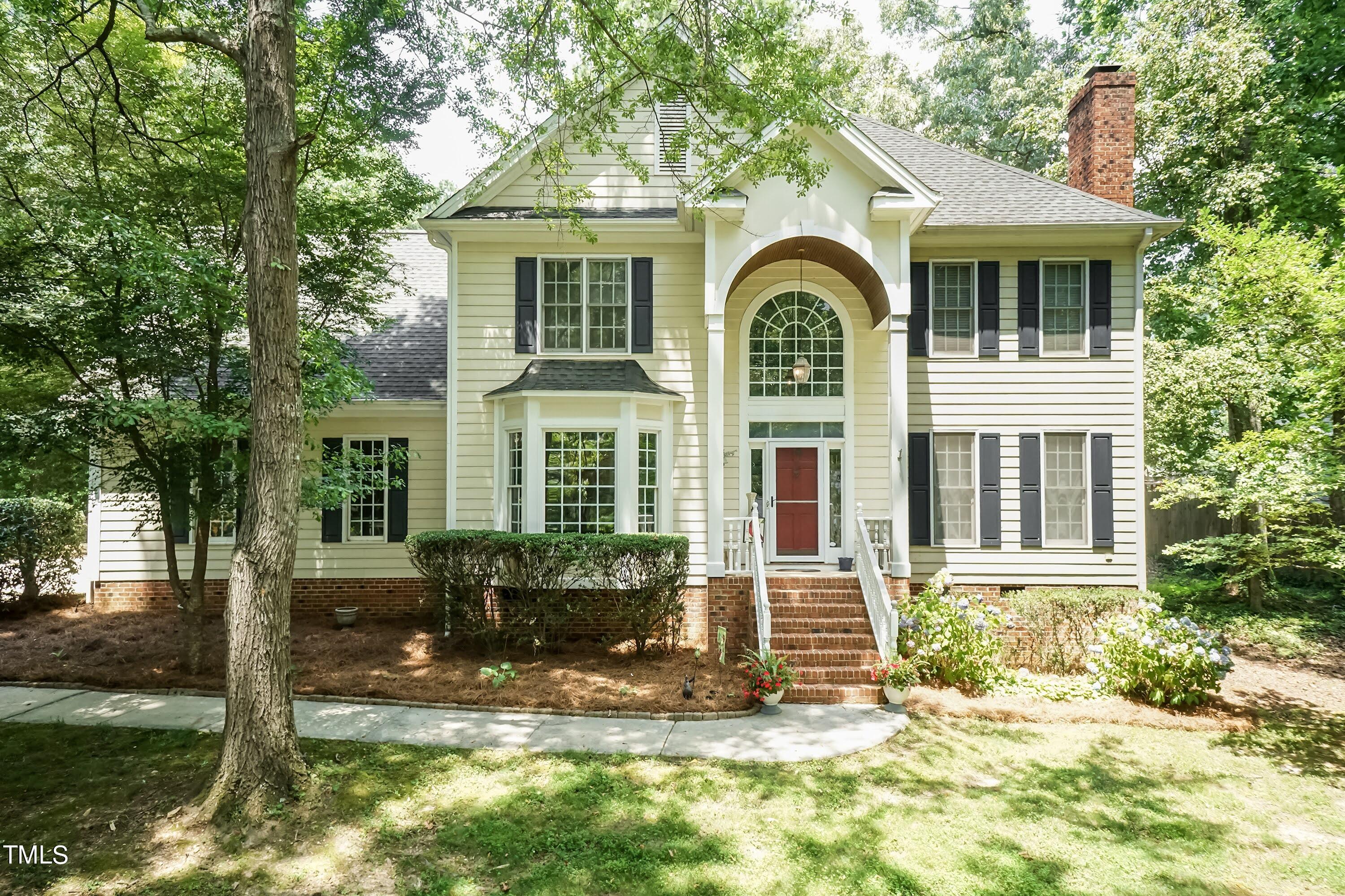 4112 Ridgebrook Bluffs Drive Raleigh, NC 27603 - Photo 1 of 40 Inviting traditional home sitting on large .77 acrea homsite