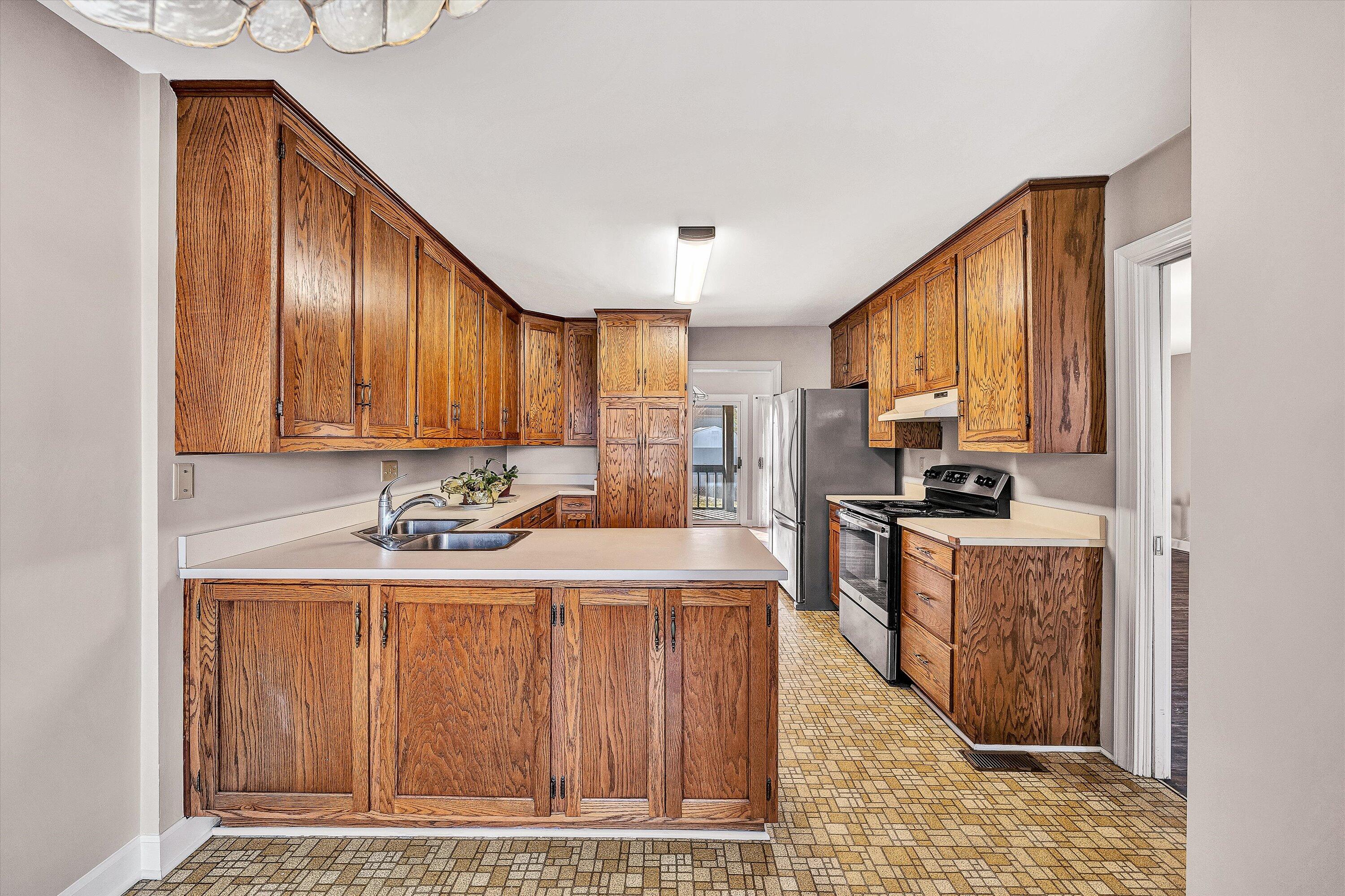 2537 South Clearing Road Salem, VA 24153 - Photo 12 of 28 a kitchen with a sink cabinets and appliances