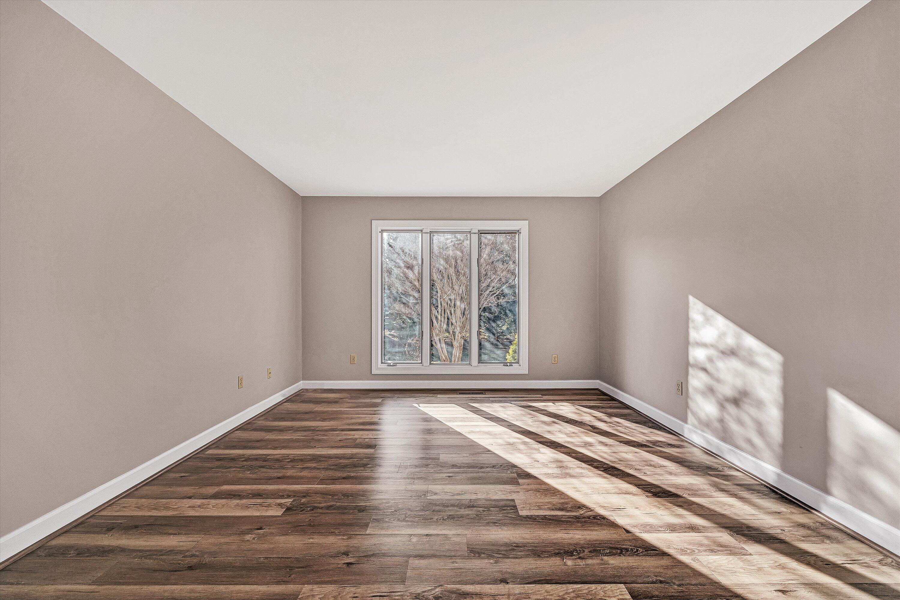2537 South Clearing Road Salem, VA 24153 - Photo 22 of 28 a view of an empty room with wooden floor and a window