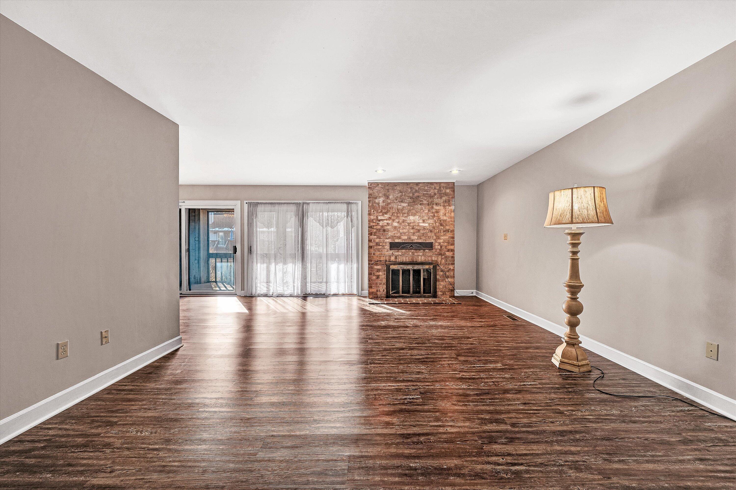 2537 South Clearing Road Salem, VA 24153 - Photo 5 of 28 a view of empty room with wooden floor and fan