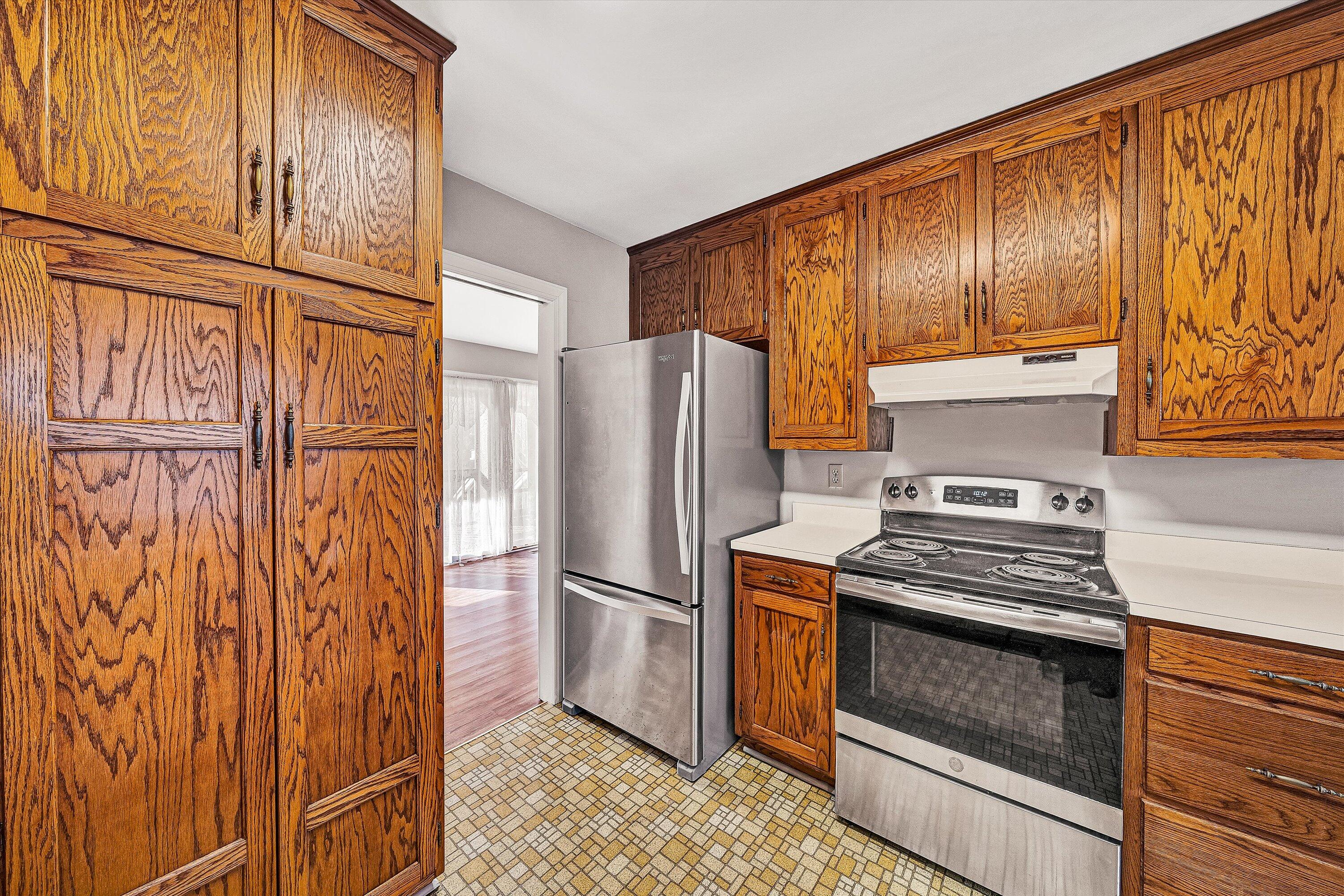 2537 South Clearing Road Salem, VA 24153 - Photo 10 of 28 a kitchen with stainless steel appliances granite countertop a refrigerator and a stove top oven