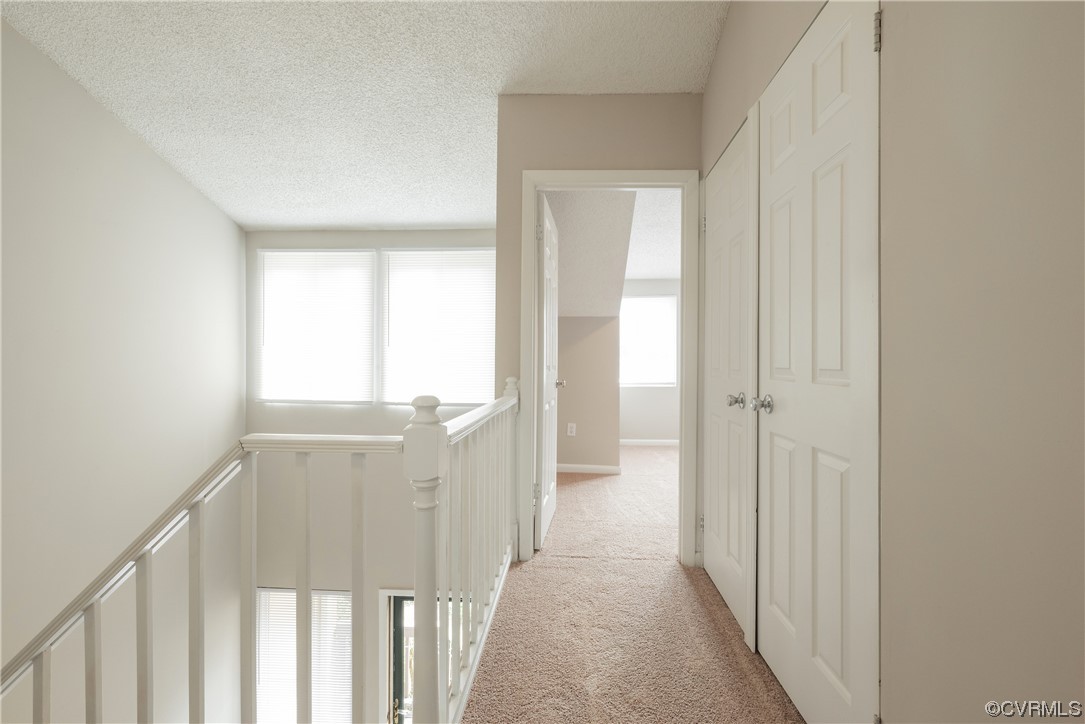 2675 Chancer Drive Henrico, VA 23233 - Photo 26 of 49 a view of a hallway with wooden floor and windows