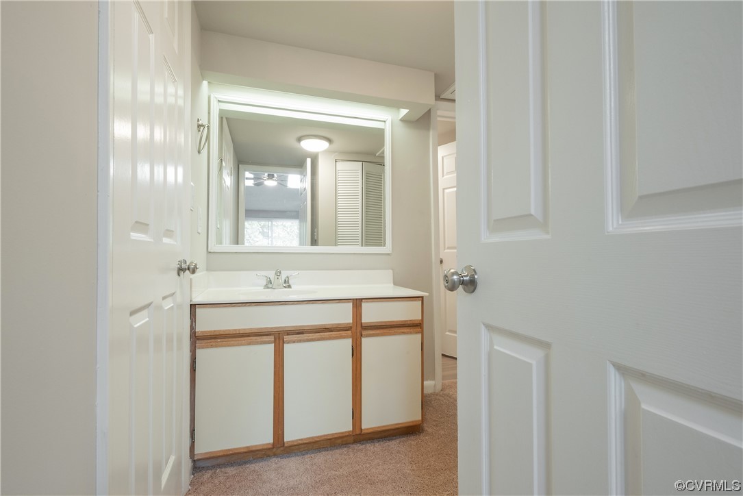 2675 Chancer Drive Henrico, VA 23233 - Photo 30 of 49 a bathroom with a sink and a mirror