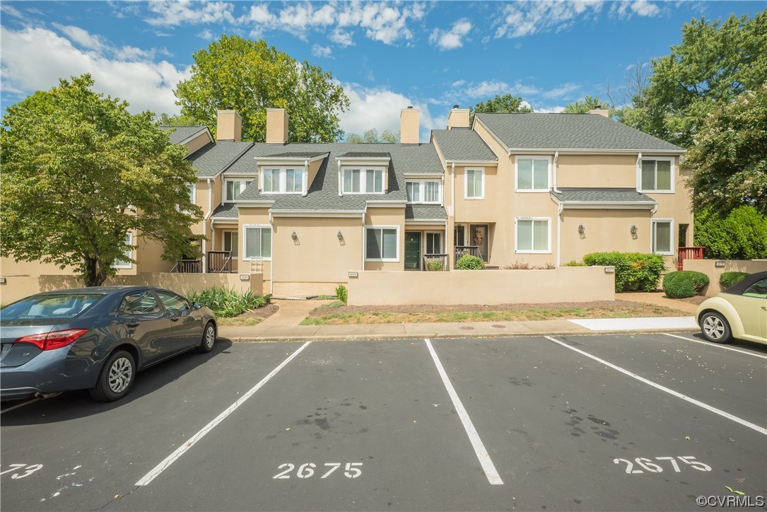 2675 Chancer Drive Henrico, VA 23233 - Photo 3 of 49 a view of a street that has couple of cars parked on the roadside