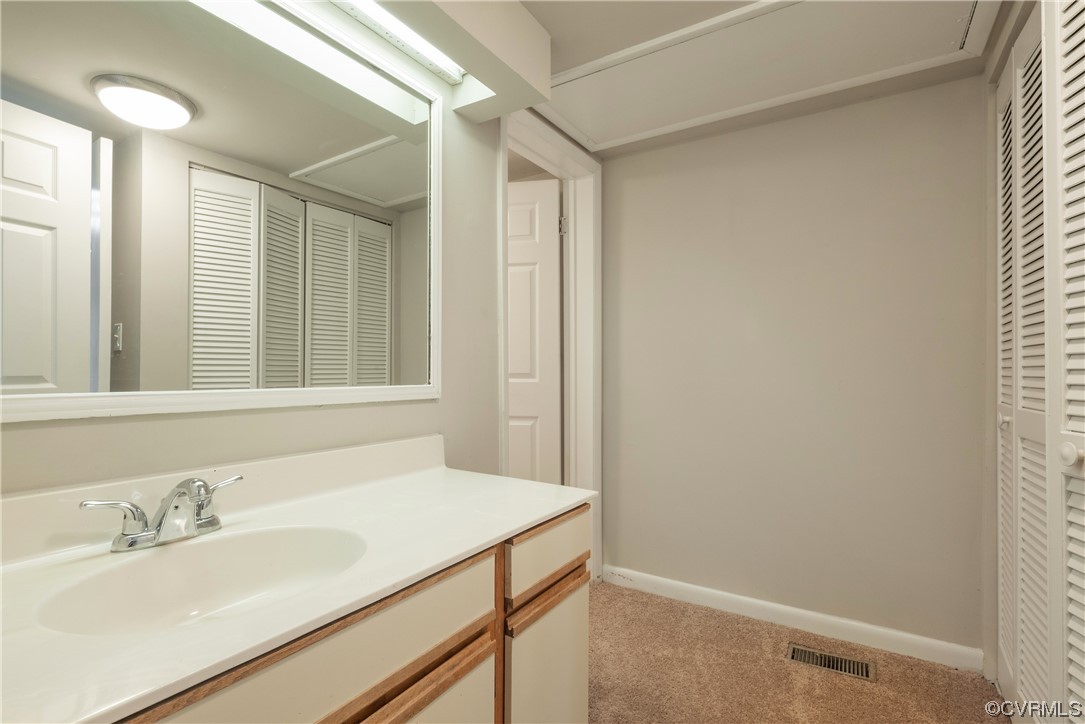 2675 Chancer Drive Henrico, VA 23233 - Photo 31 of 49 a bathroom with a sink and a mirror