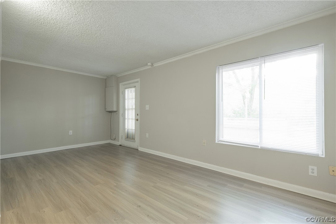 2675 Chancer Drive Henrico, VA 23233 - Photo 38 of 49 an empty room with wooden floor and windows