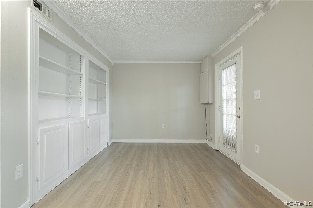 2675 Chancer Drive Henrico, VA 23233 - Photo 39 of 49 a view of an empty room with wooden floor and a window