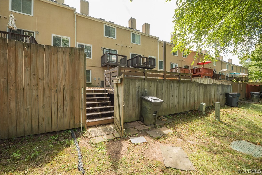 2675 Chancer Drive Henrico, VA 23233 - Photo 46 of 49 a view of a backyard with chairs