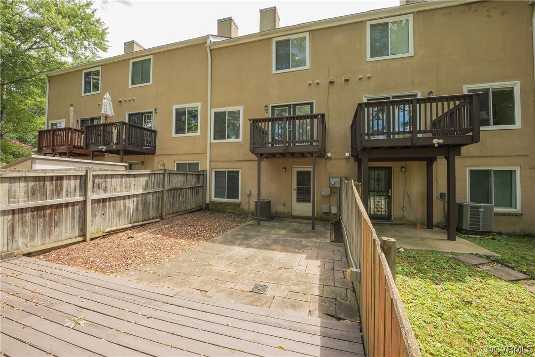 2675 Chancer Drive Henrico, VA 23233 - Photo 47 of 49 a view of a house with a barbeque and wooden stairs