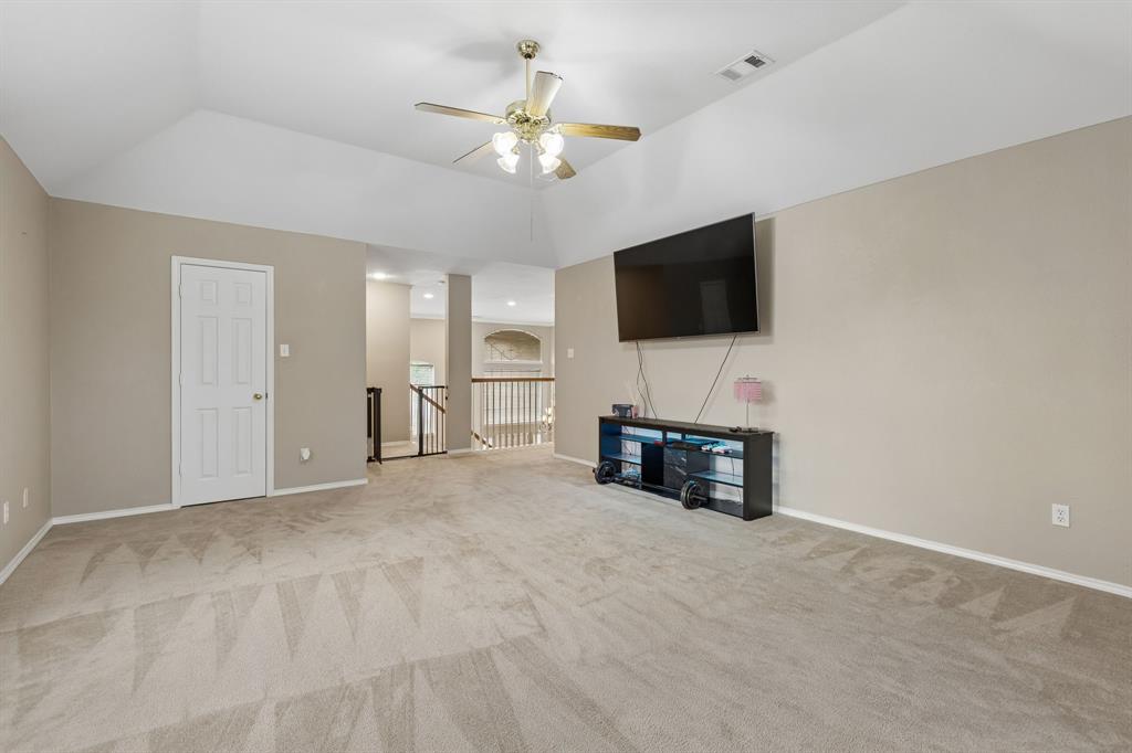 129 Timberbluff Lane Murphy, TX 75094 - Photo 23 of 34 a view of a livingroom with a flat screen tv