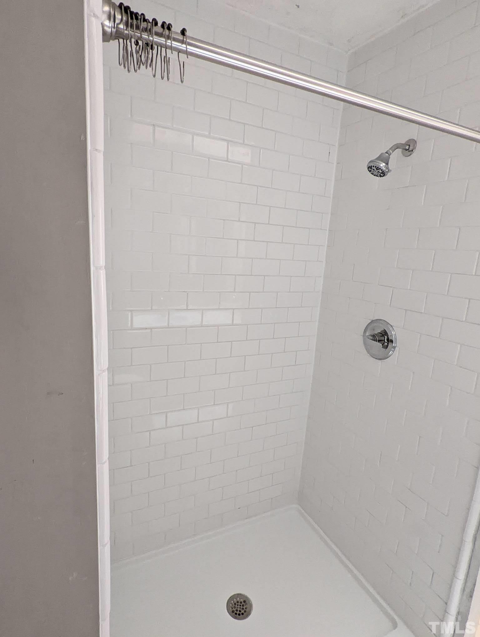 4626 Townesbury Lane Raleigh, NC 27612 - Photo 8 of 8 a bathroom with a shower