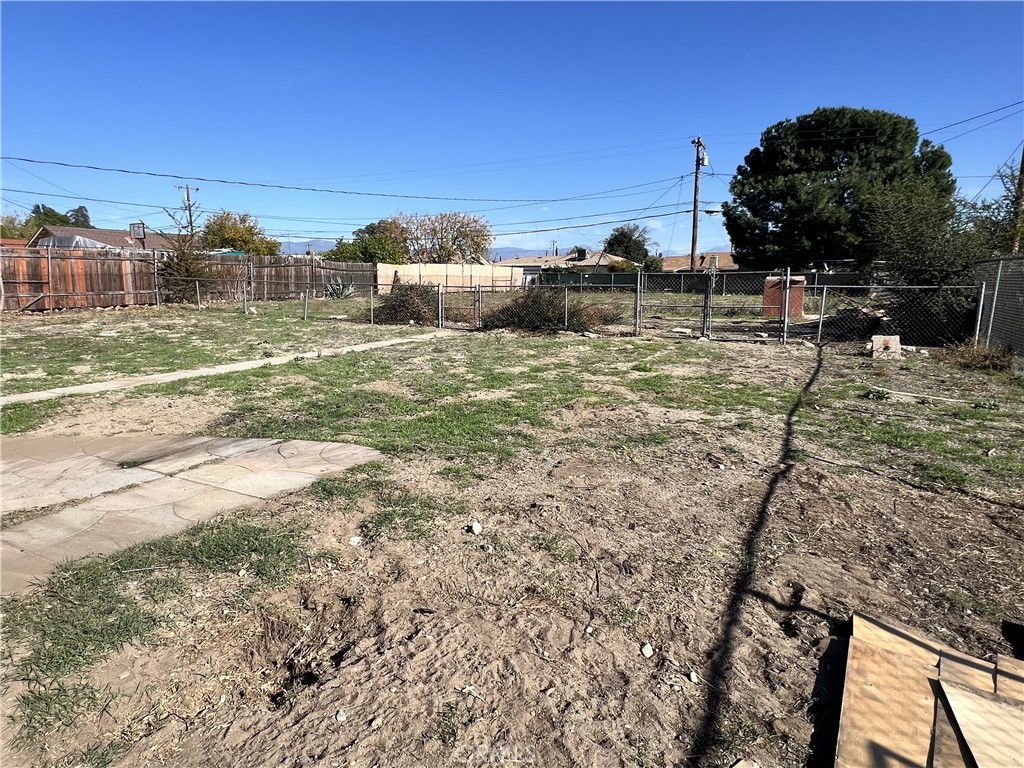 9467 Palm Lane Fontana, CA 92335 - Photo 13 of 13 a view of a backyard