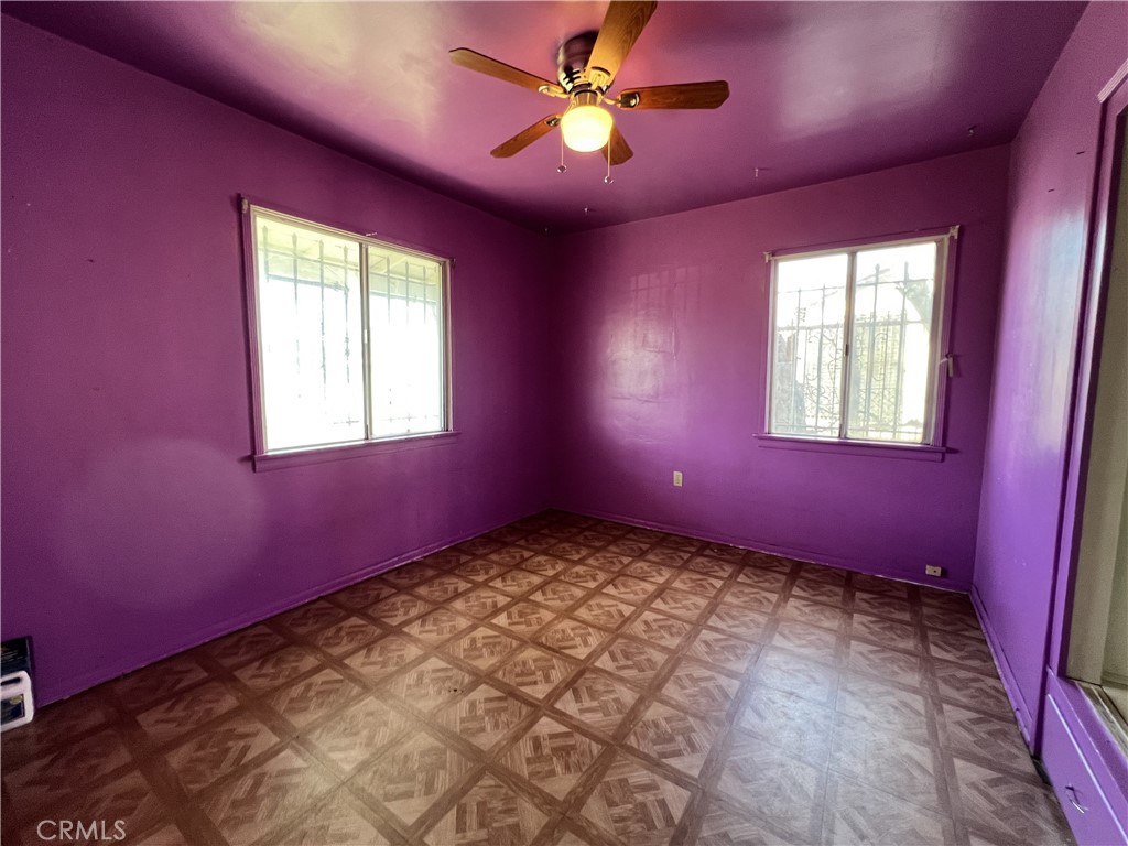 9467 Palm Lane Fontana, CA 92335 - Photo 5 of 13 a view of an empty room with a window