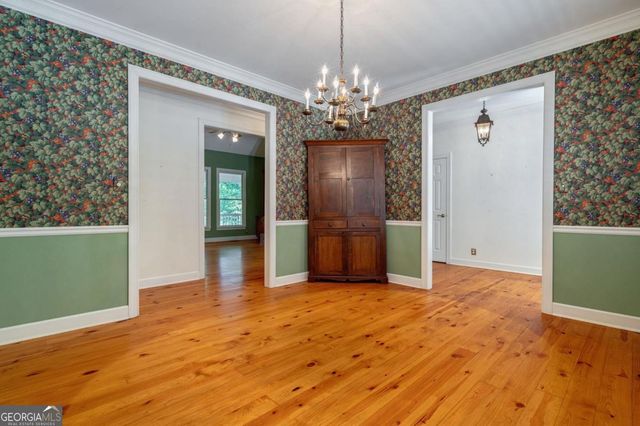 a kitchen with a stove and a cabinet