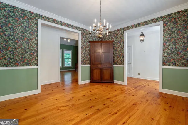 a kitchen with a stove and a cabinet