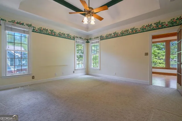 a bathroom with a sink a mirror and a shower