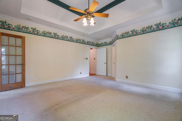 a view of a livingroom with a staircase