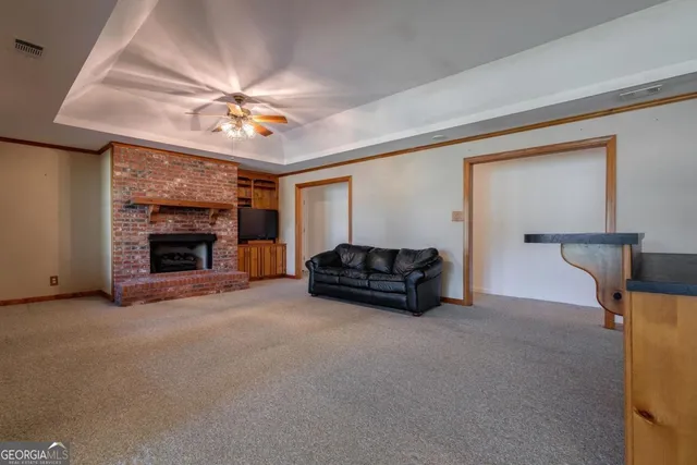 a view of a lake with boats and a mountain view