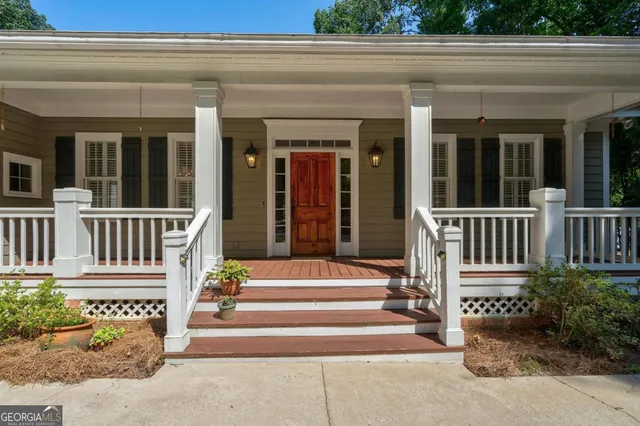 a view of a tree in front of a house