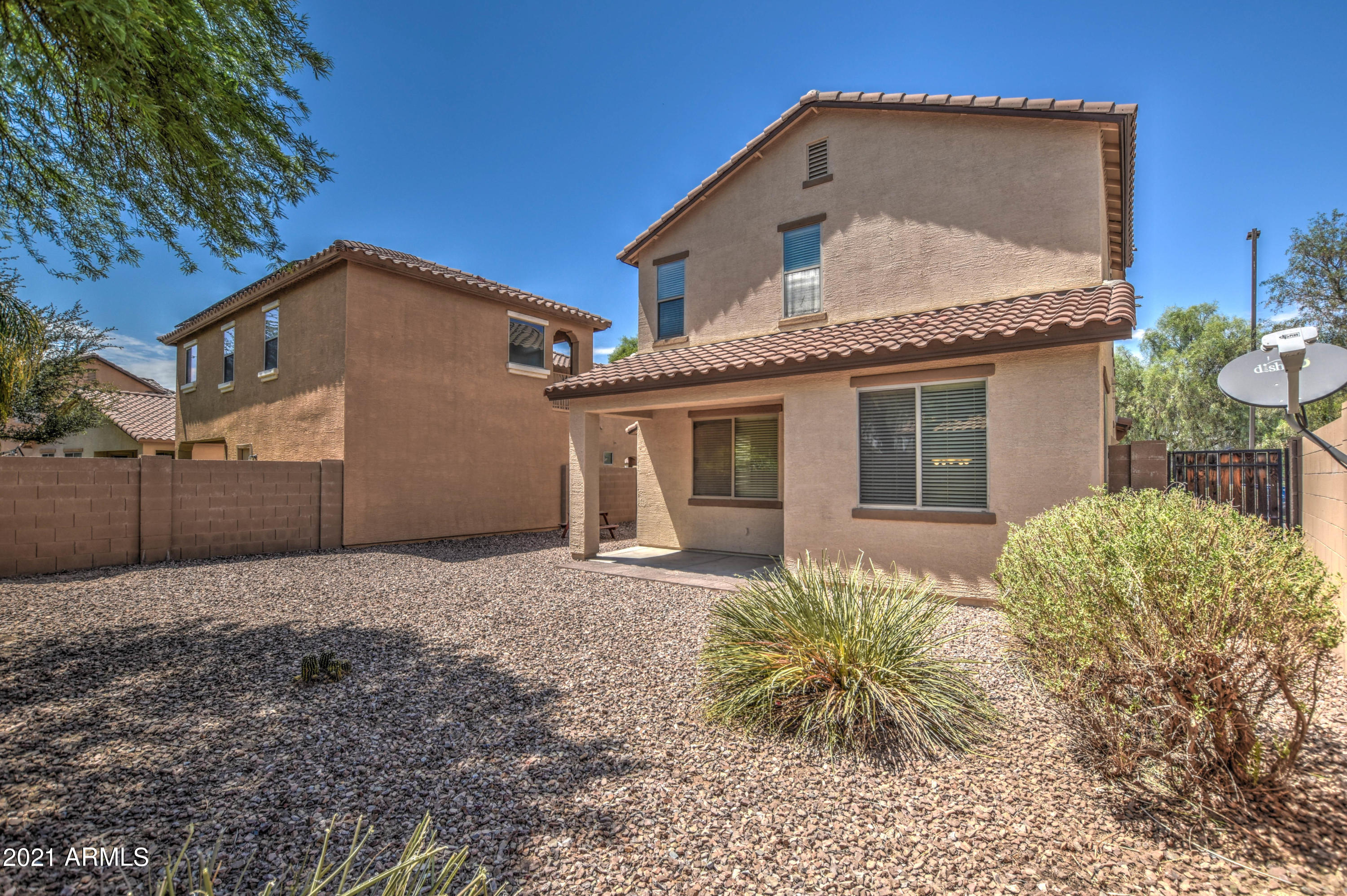 3787 East Chickadee Road Gilbert, AZ 85297 - Photo 25 of 41 a front view of a house with a yard