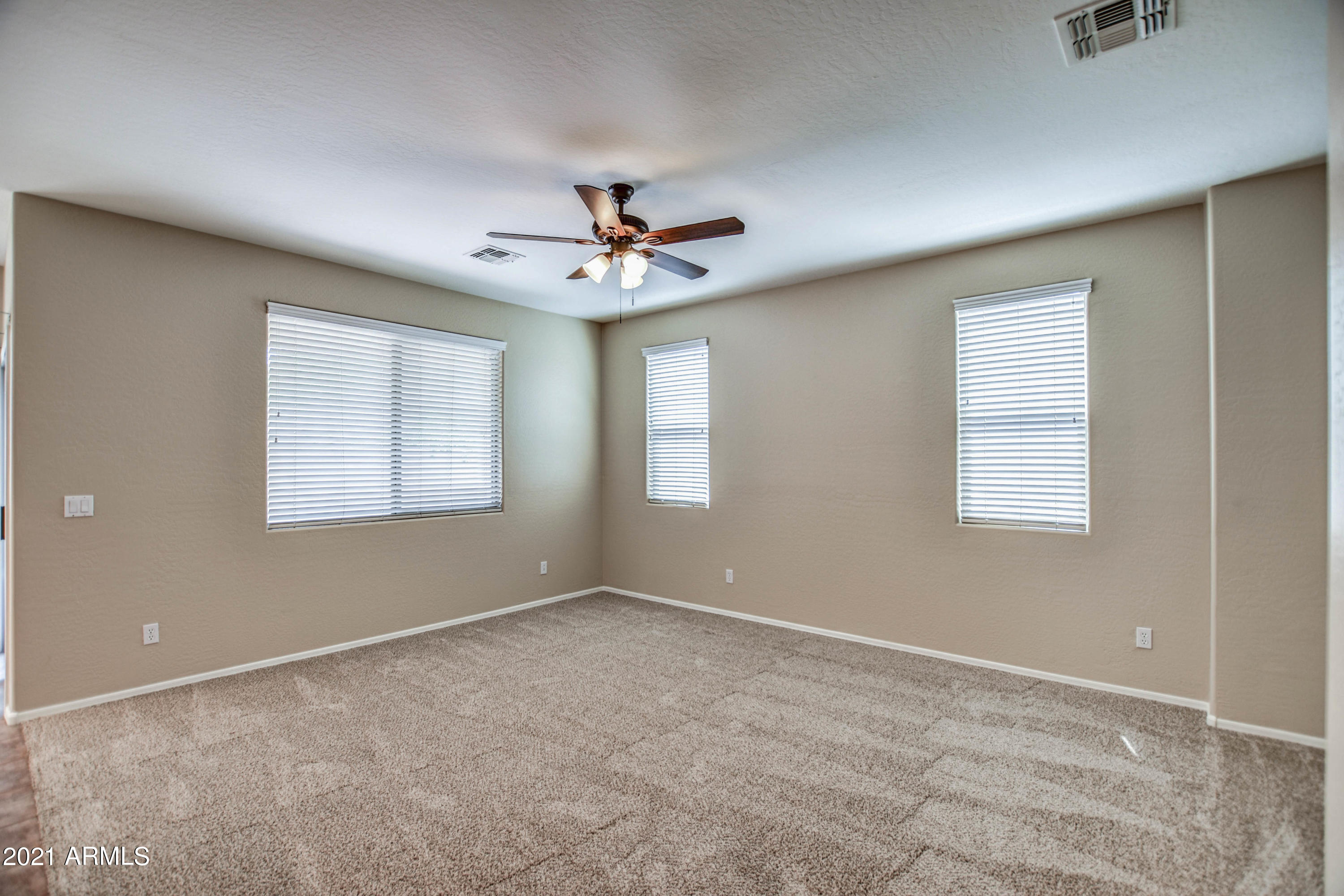 3787 East Chickadee Road Gilbert, AZ 85297 - Photo 9 of 41 a view of an empty room with a window