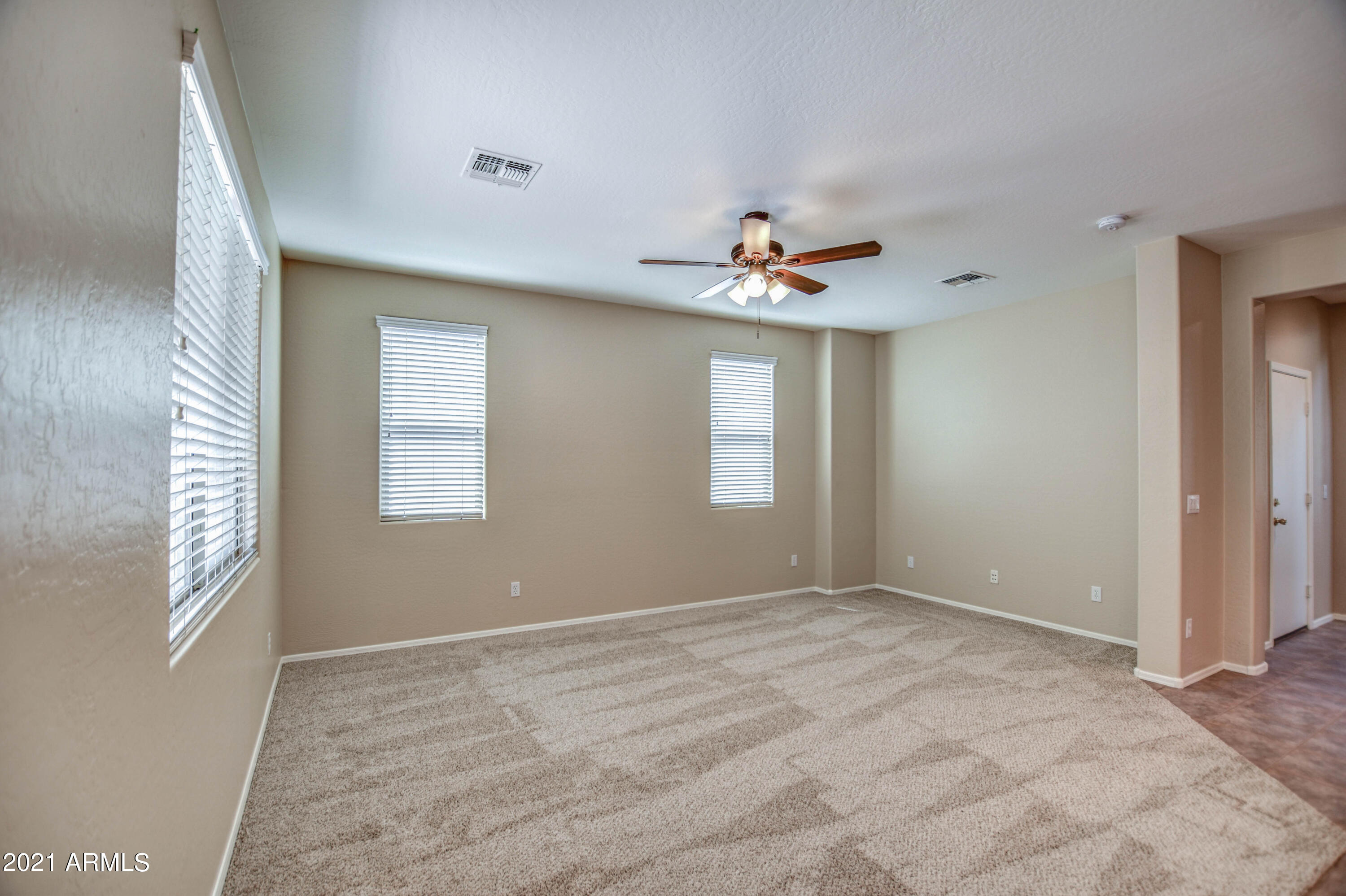 3787 East Chickadee Road Gilbert, AZ 85297 - Photo 10 of 41 a view of an empty room with a window
