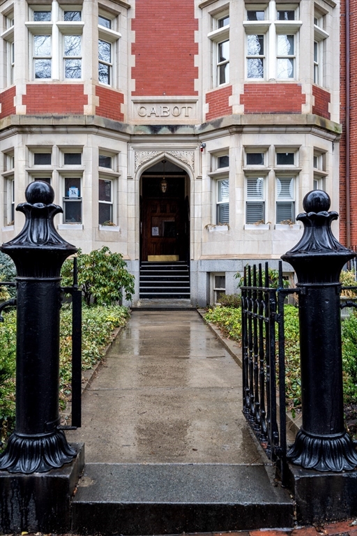 a front view of a building with glass windows