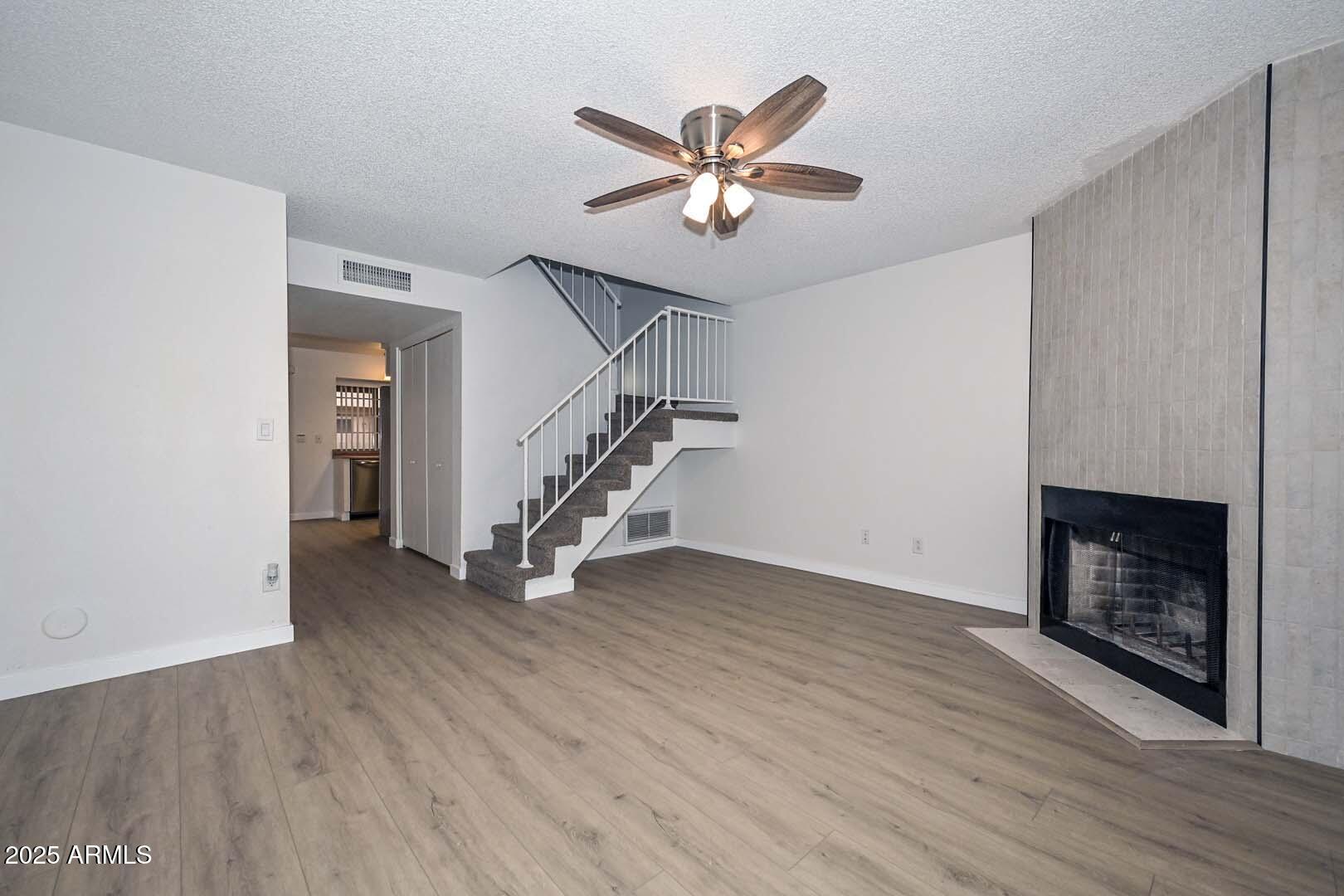7977 West Wacker Road, Unit 174 Peoria, AZ 85381 - Photo 9 of 42 Great Room-Staircase