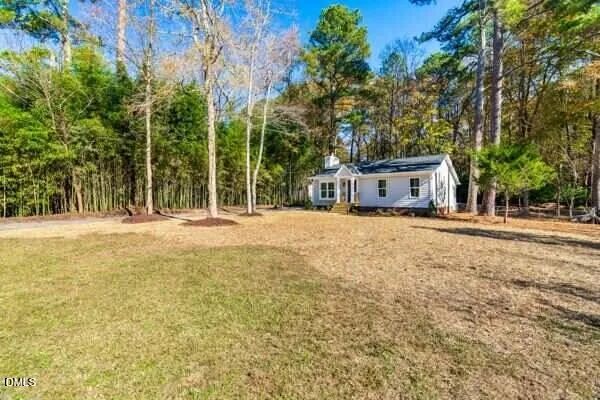 a house view with a outdoor space