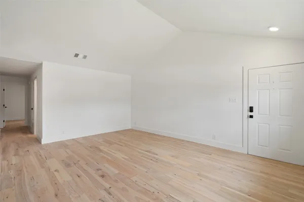a view of a kitchen with a sink dishwasher and a refrigerator