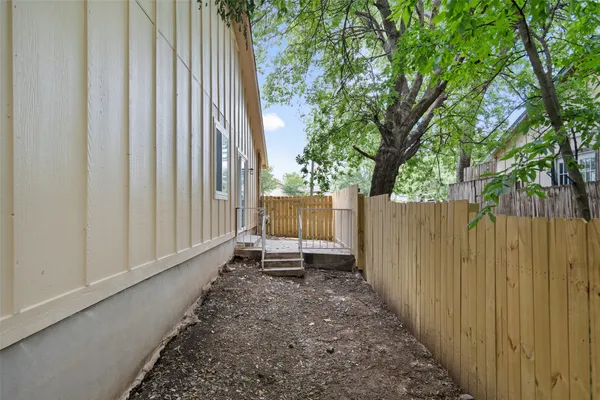 a view of a balcony with furniture